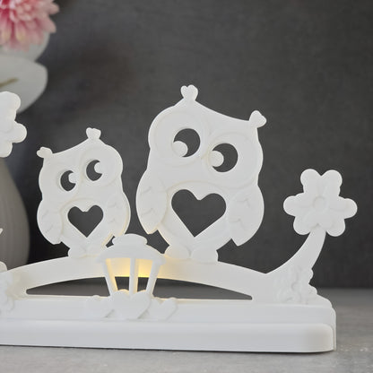 Leuchtbogen · Eulenpaar